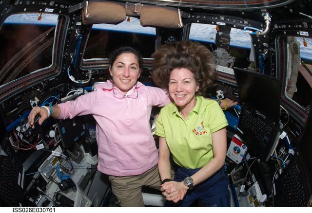 NASA image: Stott and Coleman pose in the Cupola Module