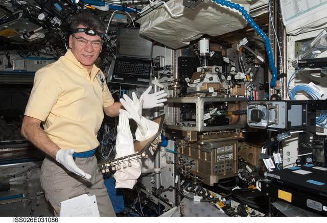 NASA image: Nespoli works with the LMM Spindle Bracket Assembly in the FIR