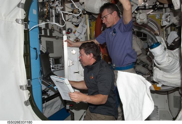 NASA image: Barratt and Nespoli in the A/L