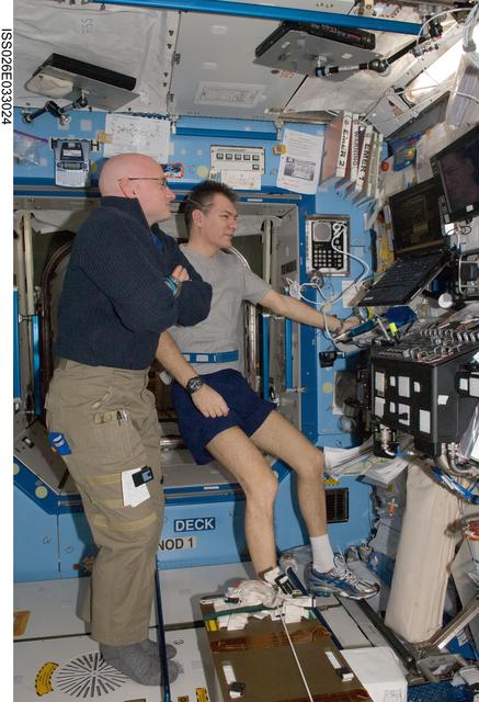 NASA image: Kelly and Nespoli watch STS-133 Landing in the U.S. Laboratory