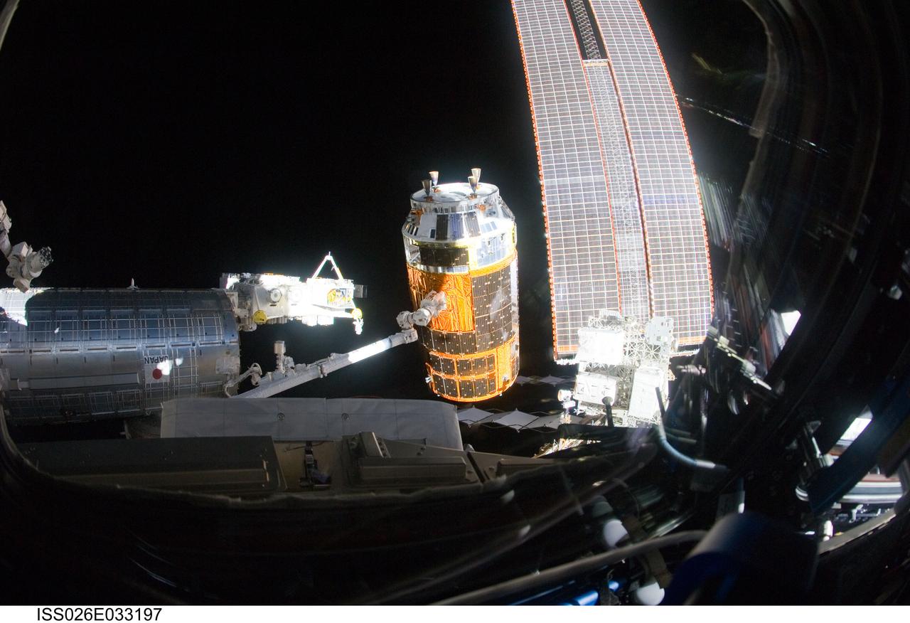 ISS026-E-033197 (10 March 2011) --- In the grasp of the International Space Station’s Canadarm2, the Kounotori2 H-II Transfer Vehicle (HTV-2) is moved from the space-facing side of the Harmony node back to the Earth-facing port of Harmony. HTV-2 had been moved to the top of Harmony prior to space shuttle Discovery’s arrival for the STS-133 mission. The HTV-2, loaded with trash and materials no longer needed by the station crew, will be unberthed for the final time on March 28 and deorbited the following day.