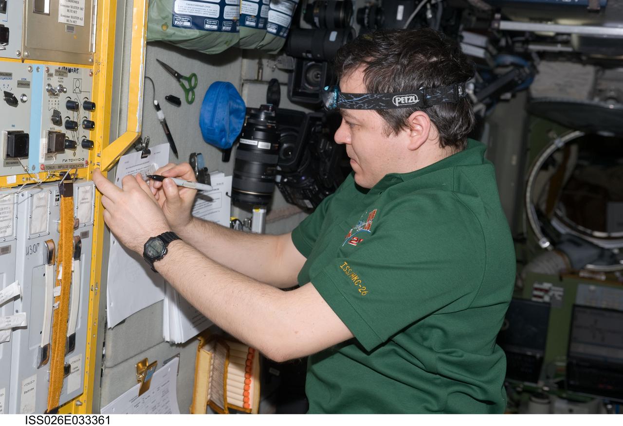 ISS026-E-033361 (11 March 2011) --- Russian cosmonaut Oleg Skripochka, Expedition 26 flight engineer, works in the Zvezda Service Module of the International Space Station.