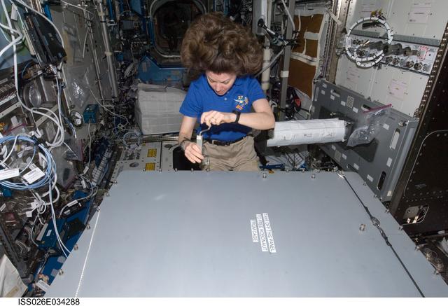 NASA image: Coleman opens Robonaut 2 Container in the U.S. Laboratory