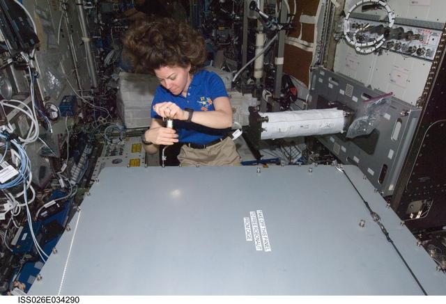 NASA image: Coleman opens Robonaut 2 Container in the U.S. Laboratory