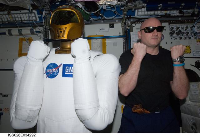 NASA image: Kelly poses with Robonaut 2 in the U.S. Laboratory