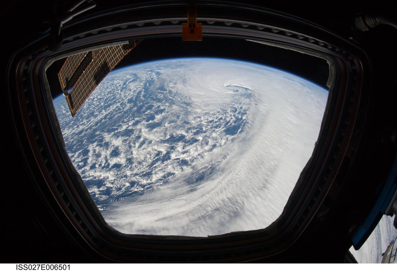 ISS027-E-006501 (20 March 2011) --- A low pressure system in the eastern North Pacific Ocean is featured in this image photographed by an Expedition 27 crew member in the Cupola of the International Space Station. This vigorous low pressure system has started to occlude?a process associated with separation of warm air from the cyclone?s center at the Earth?s surface. This view shows the arc of strong convection beyond the center of the low pressure, formed as the low occludes when the cold front overtakes the warm front. This occurs around more mature low pressure areas, later in the process of the system?s life-cycle.