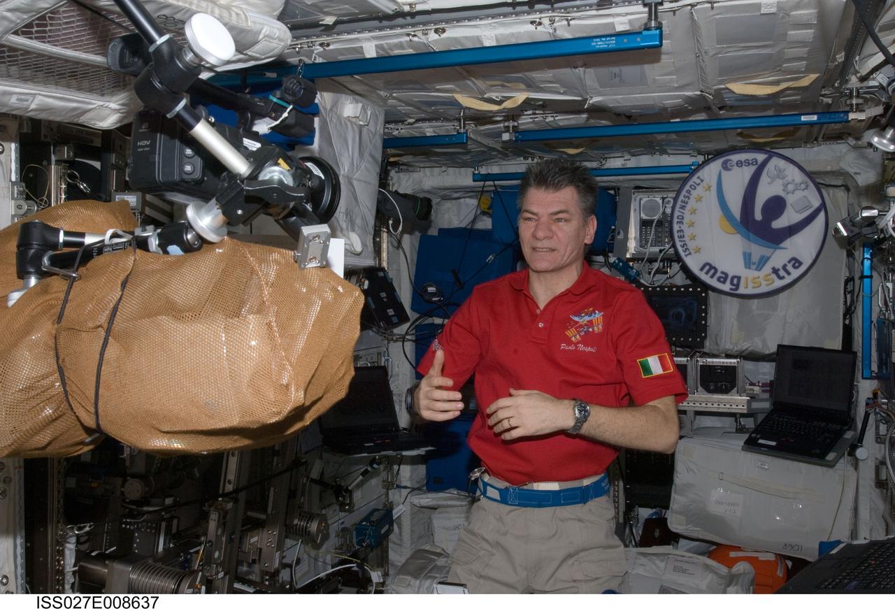 ISS027-E-008637 (21 March 2011) --- European Space Agency astronaut Paolo Nespoli, Expedition 27 flight engineer, is pictured in the Columbus laboratory of the International Space Station.