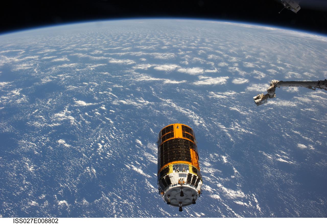 ISS027-E-008802 (28 March 2011) --- Backdropped by a blue and white part of Earth, the unpiloted Japan Aerospace Exploration Agency?s Kounotori2 H-II Transfer Vehicle (HTV2), filled with trash and unneeded items, departs from the International Space Station. NASA astronaut Cady Coleman and European Space Agency astronaut Paolo Nespoli, both Expedition 27 flight engineers, used the station?s robot arm to grapple the HTV2 and unberth it from the Earth-facing port of the Harmony node. The cargo craft was released at 11:46 a.m. (EDT) on March 28, 2011.