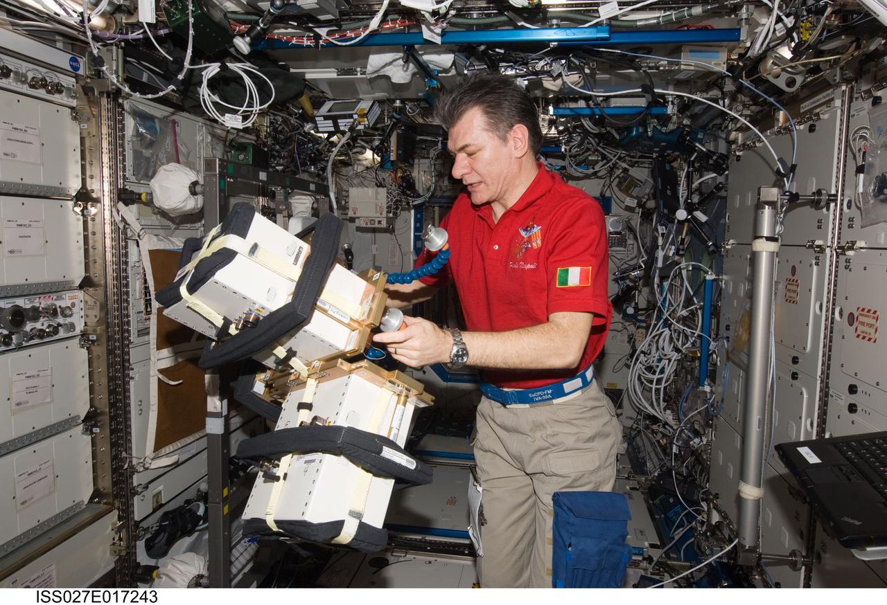 ISS027-E-017243 (23 April 2011) --- European Space Agency astronaut Paolo Nespoli, Expedition 27 flight engineer, works with Anomalous Long Term Effects on Astronauts (ALTEA) Shield isotropic equipment in the Destiny laboratory of the International Space Station. ALTEA-Shield isotropic dosimetry uses existing ALTEA hardware to survey the radiation environment in the Destiny laboratory in 3D. It also measures the effectiveness and shielding properties of several materials with respect to the perception of anomalous light flashes.
