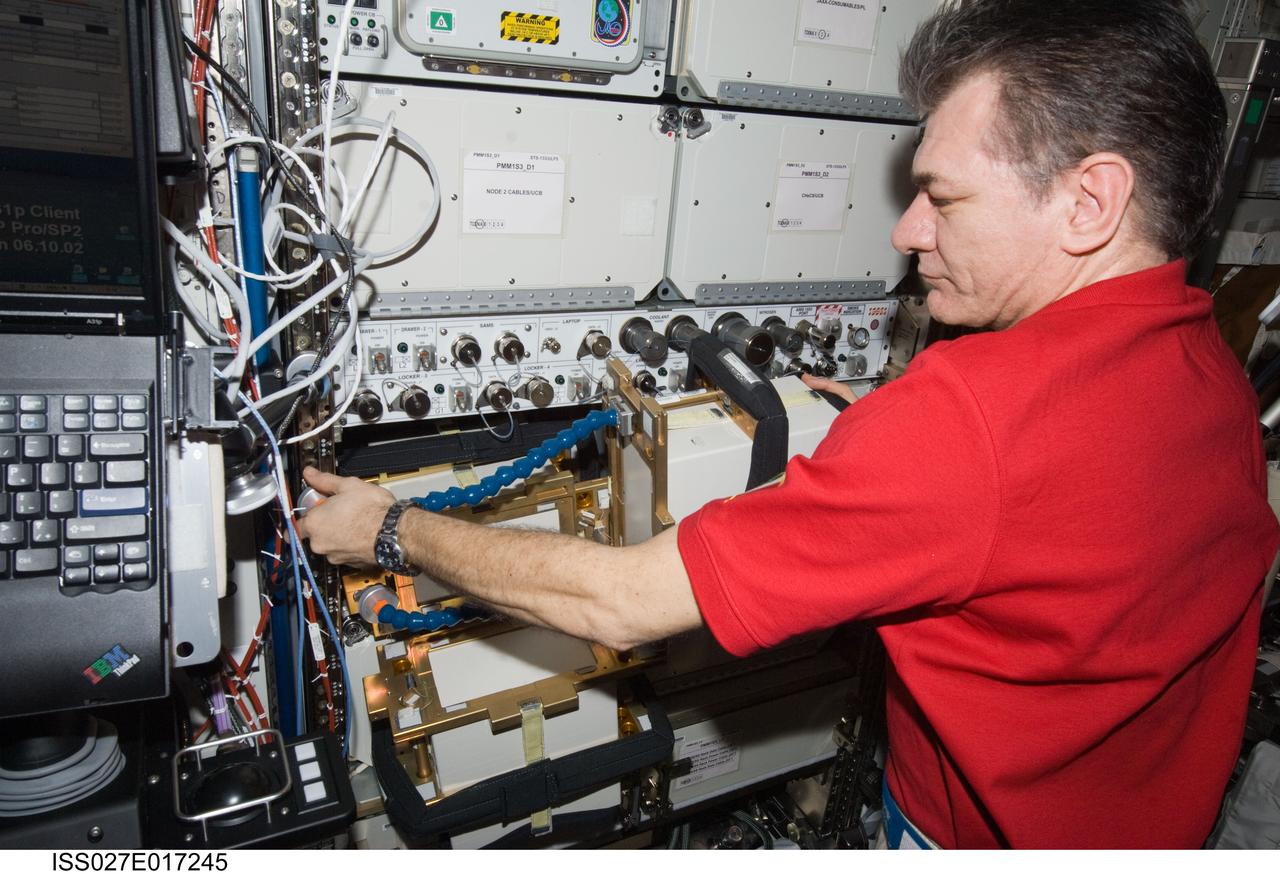 ISS027-E-017245 (23 April 2011) --- European Space Agency astronaut Paolo Nespoli, Expedition 27 flight engineer, works with Anomalous Long Term Effects on Astronauts (ALTEA) Shield isotropic equipment in the Destiny laboratory of the International Space Station. ALTEA-Shield isotropic dosimetry uses existing ALTEA hardware to survey the radiation environment in the Destiny laboratory in 3D. It also measures the effectiveness and shielding properties of several materials with respect to the perception of anomalous light flashes.