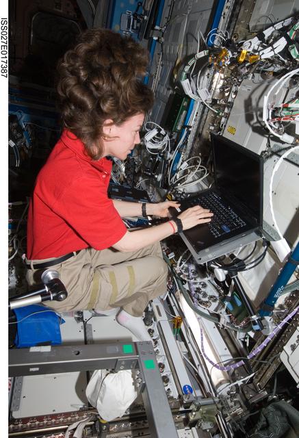 NASA image: Coleman works with AMS Laptop in the US Lab