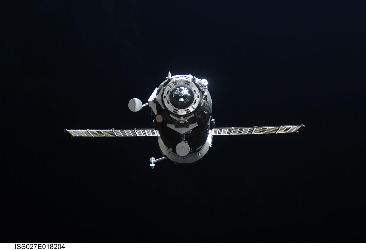 ISS027-E-018204 (29 April 2011) --- An unpiloted ISS Progress resupply vehicle approaches the International Space Station, carrying 1,940 pounds of propellant, 110 pounds of oxygen and air, 926 pounds of water and 2,976 pounds of maintenance hardware, experiment equipment and resupply items for the Expedition 27/28 crew. Progress 42 docked to the station’s Pirs docking compartment at 10:28 a.m. (EDT) on April 29, 2011.