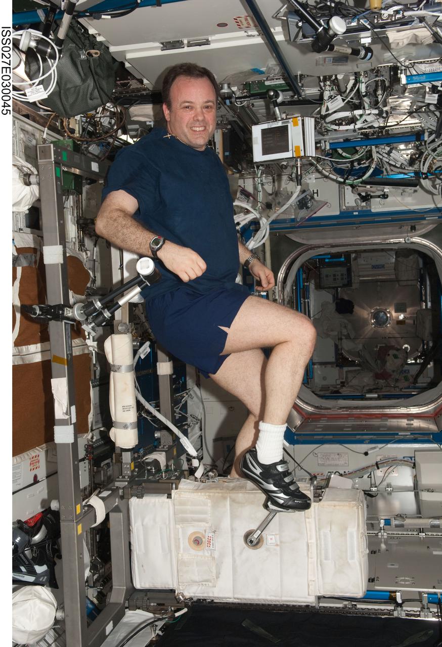 ISS027-E-030045 (11 May 2011) --- NASA astronaut Ron Garan, Expedition 27 flight engineer, exercises on the Cycle Ergometer with Vibration Isolation System (CEVIS) in the Destiny laboratory of the International Space Station.