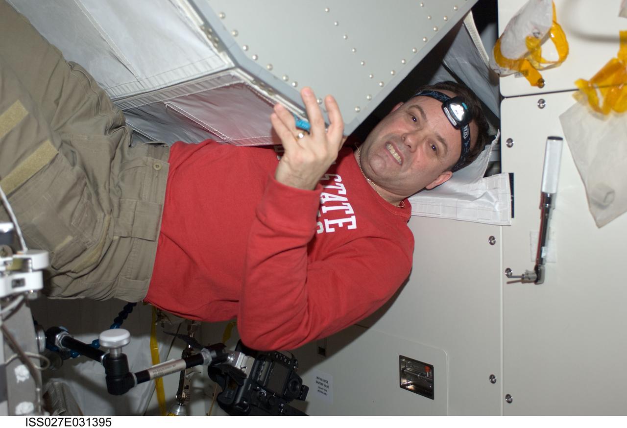 ISS027-E-031395 (16 May 2011) --- NASA astronaut Ron Garan, Expedition 27 flight engineer, installs a helium valve unit at the Common Gas Supply Equipment (CGSE) rack in the Kibo laboratory of the International Space Station.