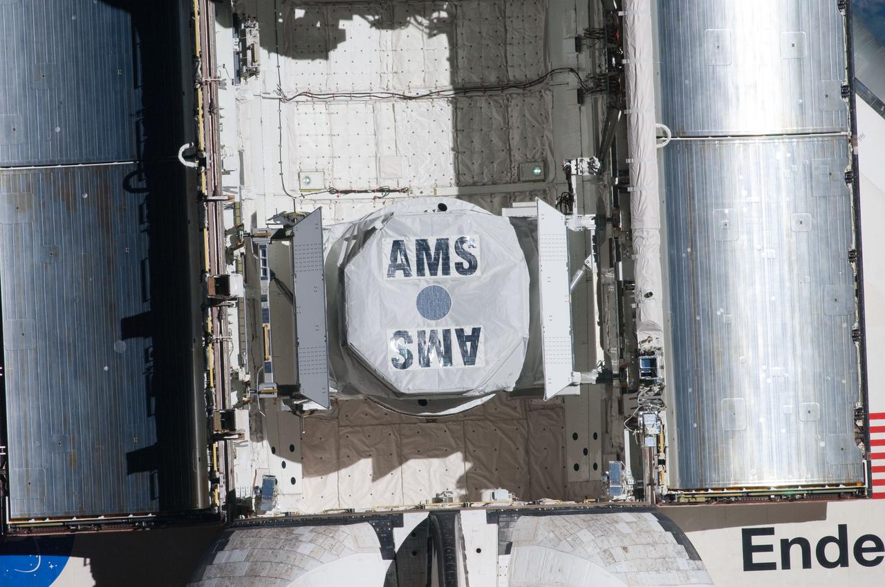 ISS027-E-032216 (18 May 2011) --- This close-up view of the Alpha Magnetic Spectrometer-2 (AMS) in space shuttle Endeavour’s payload bay was provided by an Expedition 27 crew member during a survey of the approaching STS-134 vehicle prior to docking with the International Space Station. As part of the survey and part of every mission's activities, Endeavour performed a back-flip for the rendezvous pitch maneuver (RPM). The image was photographed with a digital still camera, using a 400mm lens at a distance of about 600 feet (180 meters).