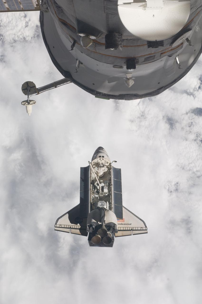 ISS027-E-032638 (18 May 2011) --- One of the Expedition 27 crew members aboard the International Space Station (ISS) recorded this image of the space shuttle Endeavour as the two spacecraft made their relative approach on May 18, 2011. Each spacecraft was occupied by six crew members until the STS-134 crew members entered the ISS minutes following the docking.