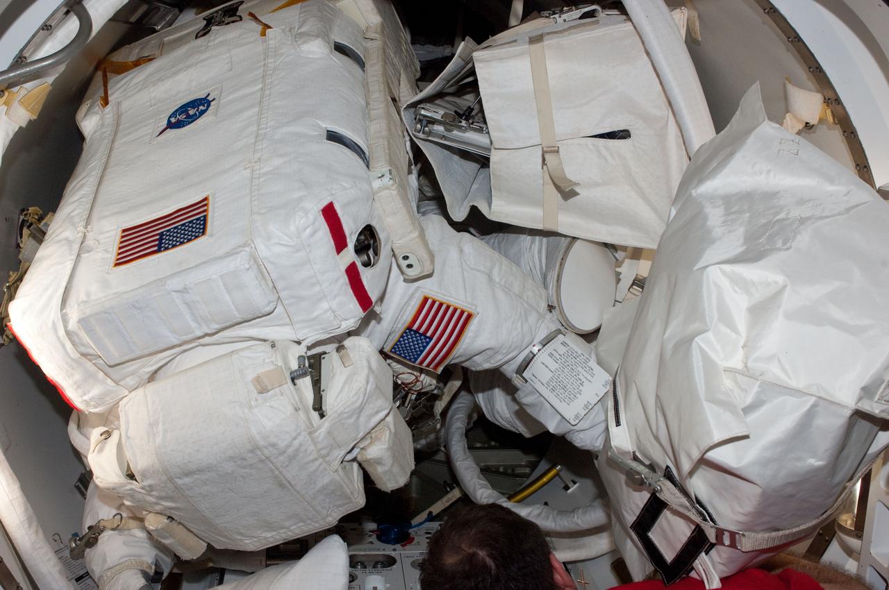 ISS027-E-034386 (20 May 2011) --- Attired in his Extravehicular Mobility Unit (EMU) spacesuit, NASA astronaut Greg Chamitoff, STS-134 mission specialist, prepares to exit the International Space Station?s Quest airlock to begin the first session of extravehicular activity (EVA) for the STS-134 mission. Astronaut Andrew Feustel (out of frame), mission specialist, joined Chamitoff on the spacewalk.