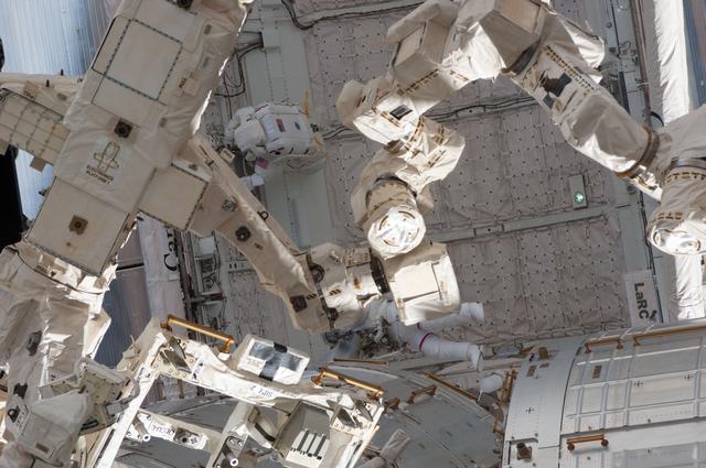 NASA image: Chamitoff and Feustel in the Endeavour Payload Bay during EVA 1