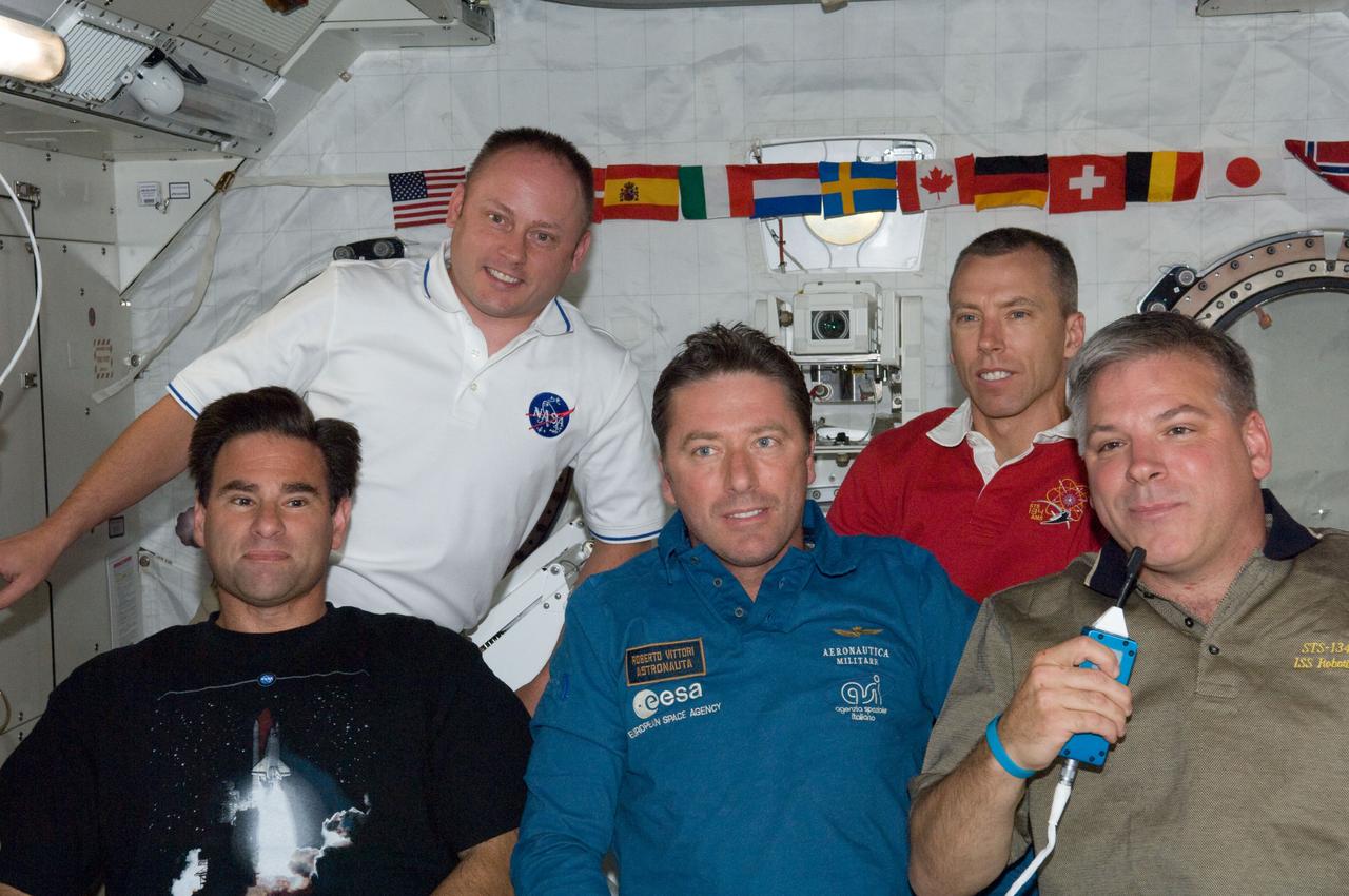 ISS027-E-034873 (19 May 2011) --- Inside Japan Aerospace Exploration Agency's Kibo lab onboard the International Space Station, five members of Endeavour's STS-134 crew respond to questions from the news media. From left to right are NASA astronauts Greg Chamitoff and Michael Fincke, European Space Agency astronaut Roberto Vittori and NASA astronaut Andrew Feustel, all mission specialists, and NASA astronaut Greg H. Johnson, pilot. Not pictured is NASA astronaut Scott Kelly, mission commander.