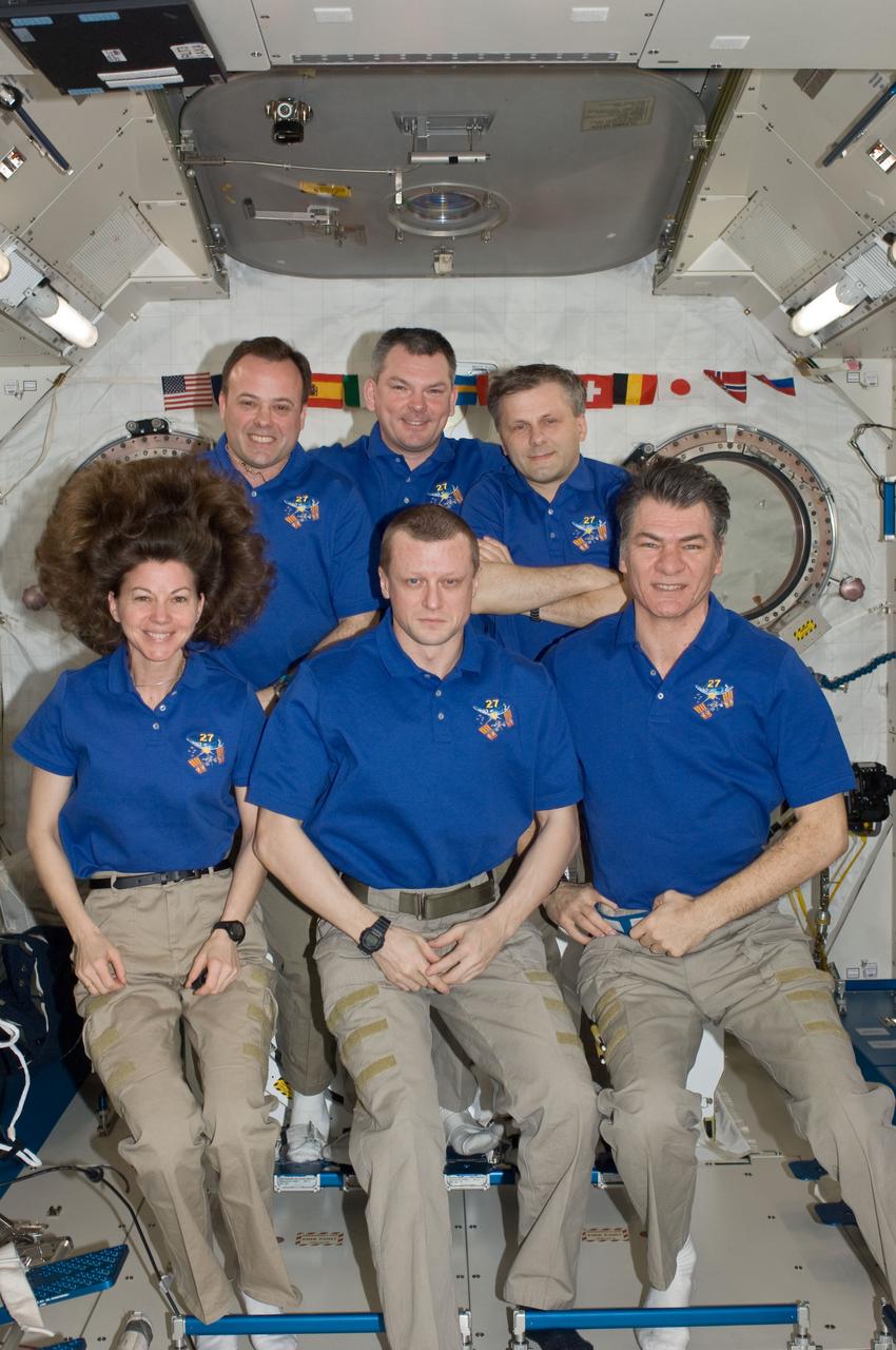 ISS027-E-035709 (21 May 2011) --- Inside the Kibo lab onboard the International Space Station, the six astronauts and cosmonauts making up the Expedition 27 crew pose for a traditional group shot. From left to right (front row) are NASA astronaut Cady Coleman, Russian cosmonaut Dmitry Kondratyev and European Space Agency astronaut Paolo Nespoli; and (back row) NASA astronaut Ron Garan, along with cosmonauts  Alexander Samokutyaev and Andrey Borisenko.