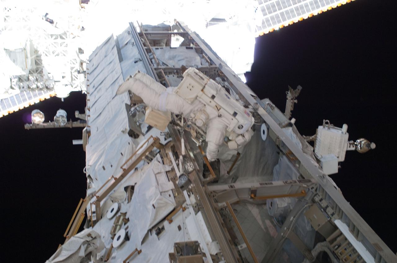 ISS28-E-005403 (25 May 2011) --- At one of the International Space Station's trusses, NASA astronaut Michael Fincke is pictured during the STS-134 mission’s third spacewalk. Astronauts Fincke and Andrew Feustel (out of frame), both mission specialists, coordinated their shared activity with NASA astronaut Greg Chamitoff (out of frame), who stayed in communication with the pair and with Mission Control Center in Houston from the shirt sleeve environment inside the station.