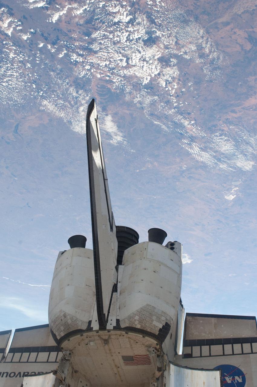 ISS028-E-005945 (27 May 2011) --- The aft section of the docked space shuttle Endeavour (STS-134) is featured in this image photographed by a crew member on the International Space Station.