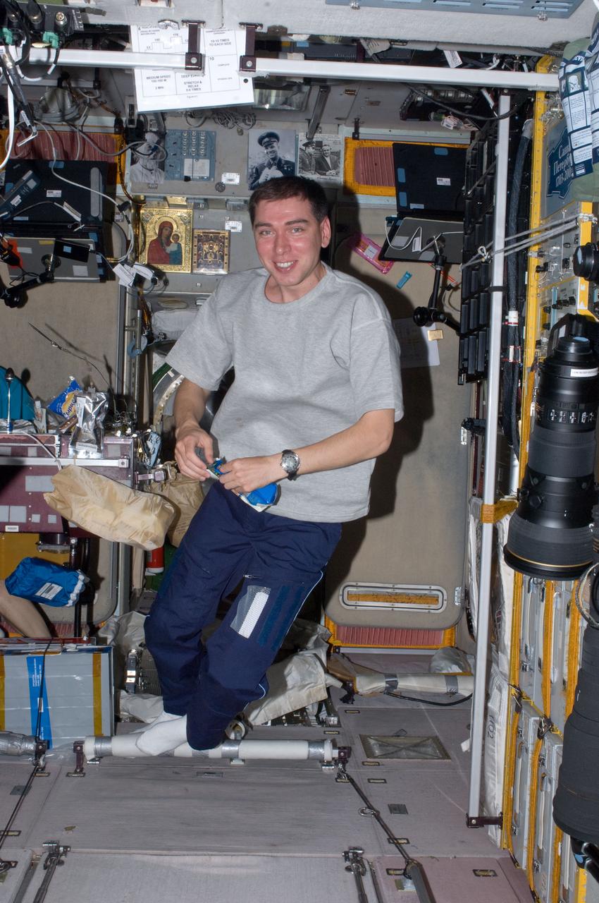 ISS028-E-007684 (17 June 2011) --- Russian cosmonaut Sergei Volkov, Expedition 28 flight engineer, is pictured near the galley in the Zvezda Service Module of the International Space Station.