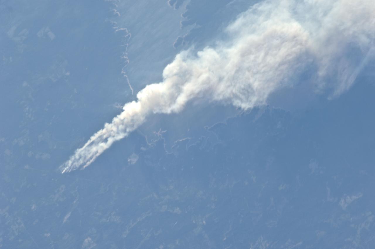 ISS028-E-008374 (21 June 2011) --- One of the Expedition 28 crew members aboard the International Space Station, flying at an altitude of approximately 235 statute miles, on June 21 spotted and photographed this image of one of the  major Texas wildfires currently burning up massive acreage.  This one is near Jasper and Lake Sam Rayburn in far east Texas.