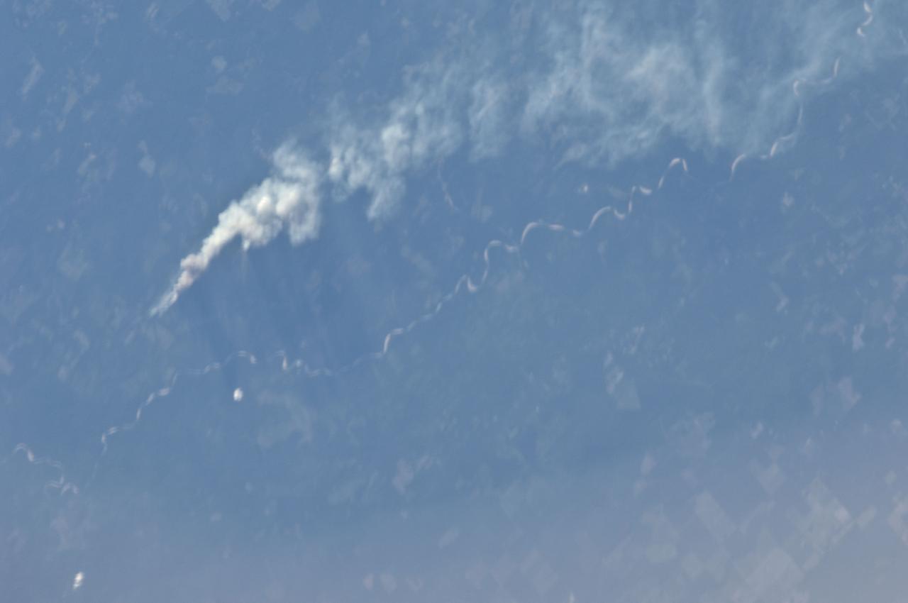 ISS028-E-008375 (21 June 2011) --- One of the Expedition 28 crew members aboard the International Space Station, flying at an altitude of approximately 235 statute miles, on June 21 spotted and photographed this image of one of the  major Texas wildfires currently burning up massive acreage.  This one is near the Sabine River, southeast of Kirbyville.