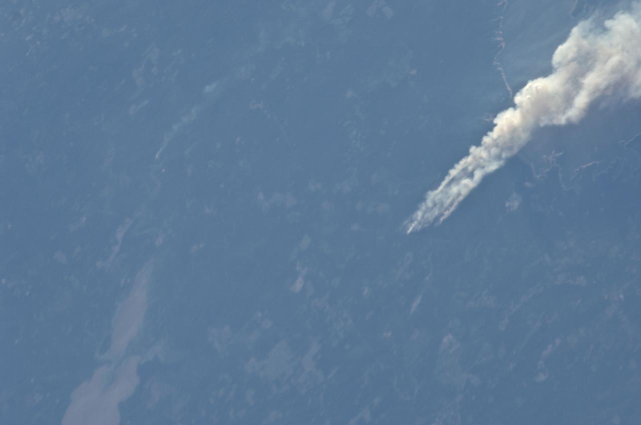 ISS028-E-008377 (21 June 2011) --- One of the Expedition 28 crew members aboard the International Space Station, flying at an altitude of approximately 235 statute miles, on June 21 spotted and photographed this image of one of the  major Texas wildfires currently burning up massive acreage.  This one is near Jasper and Lake Sam Rayburn in far east Texas.