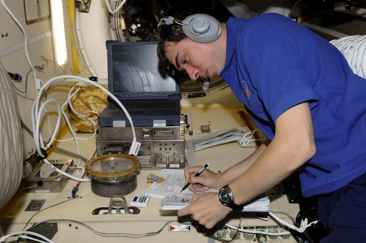 ISS028-E-009754 (27 June 2011) --- Russian cosmonaut Sergei Volkov, Expedition 28 flight engineer, works with the new KPT-21 PK-3+ Plasma Crystal-3+ (Plazmennyi-Kristall-3 plus) Telescience payload in the Poisk Mini-Research Module 2 (MRM2) of the International Space Station.