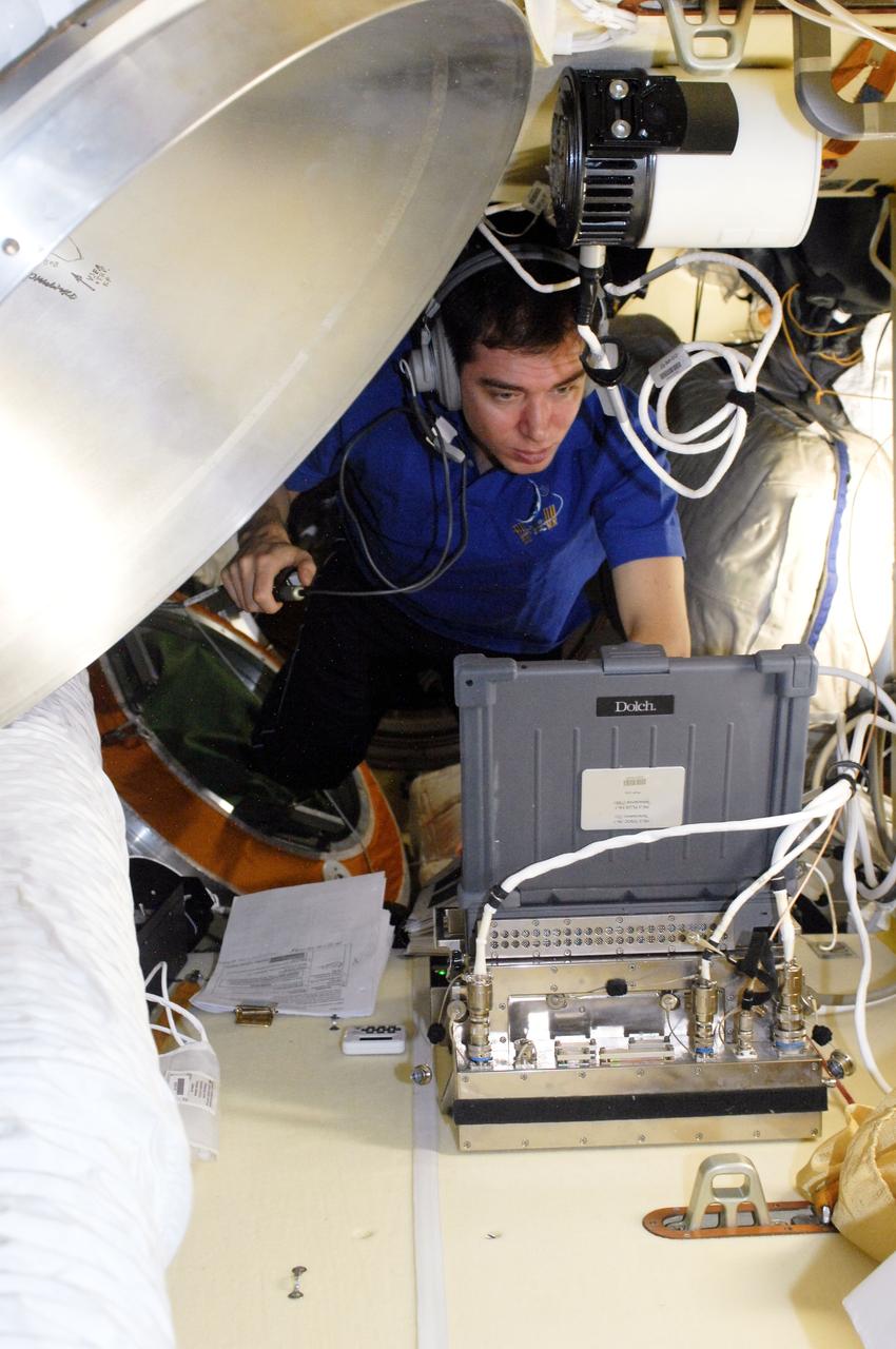 ISS028-E-009756 (27 June 2011) --- Russian cosmonaut Sergei Volkov, Expedition 28 flight engineer, works with the new KPT-21 PK-3+ Plasma Crystal-3+ (Plazmennyi-Kristall-3 plus) Telescience payload in the Poisk Mini-Research Module 2 (MRM2) of the International Space Station.