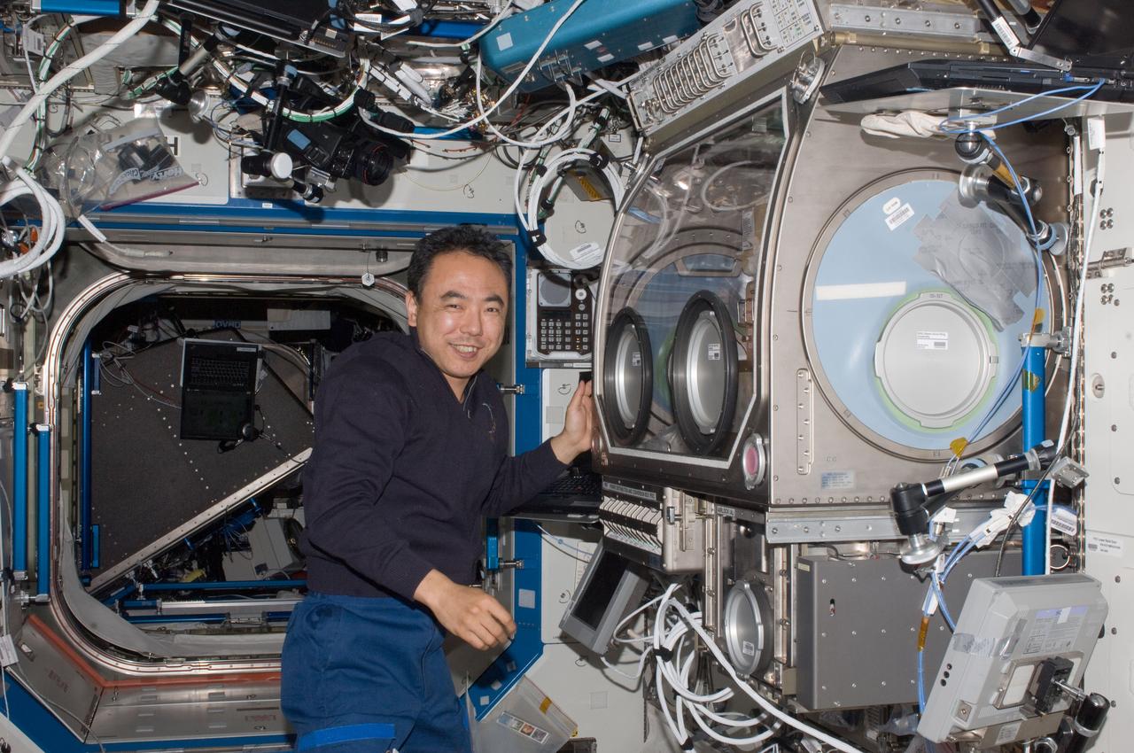 ISS028-E-012405 (30 June 2011) --- Japan Aerospace Exploration Agency astronaut Satoshi Furukawa, Expedition 28 flight engineer, is pictured near the Microgravity Science Glovebox (MSG) located in the Destiny laboratory of the International Space Station.