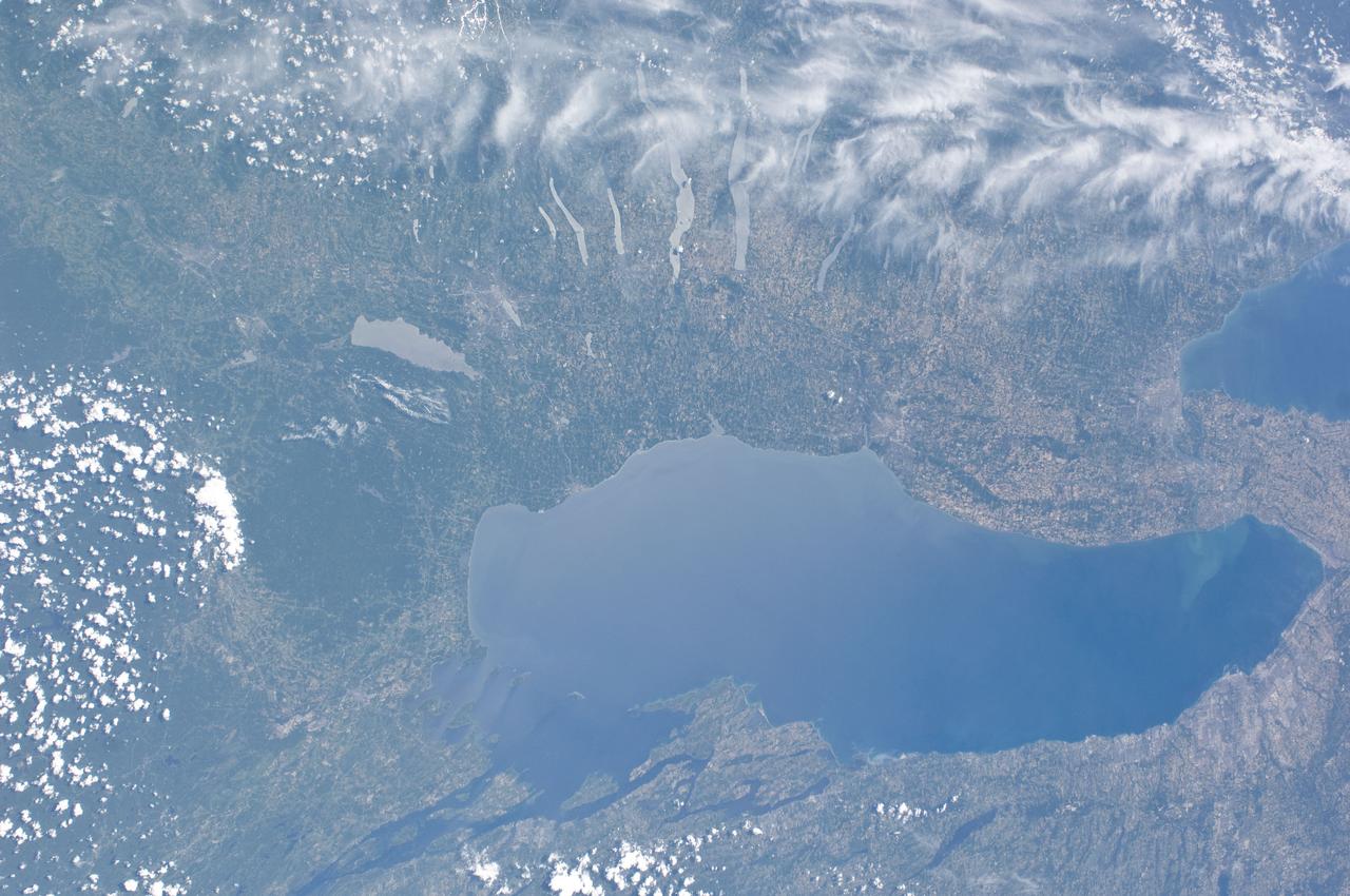 ISS028-E-013202 (4 July 2011) --- This nadir view from the International Space Station, flying at an altitude of approximately 220 miles, shows parts of two countries, including the Finger Lakes area of New York and part of two Great Lakes -- Ontario and Erie and the Niagara River, which connects them.