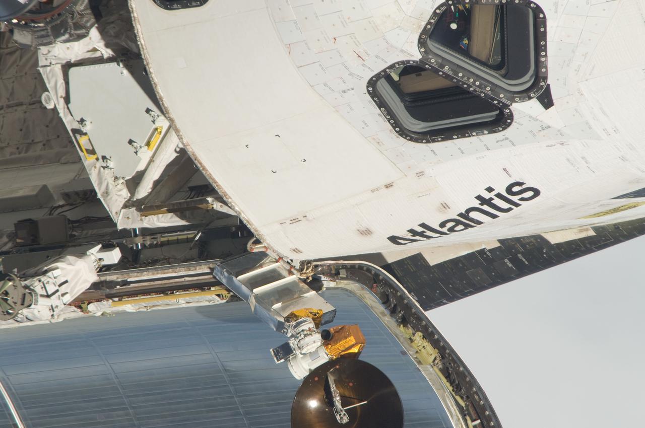 ISS028-E-015081 (10 July 2011) --- This is one of a series of images showing various parts of the space shuttle Atlantis in Earth orbit as photographed by one of the six crewmembers on the International Space Station as the shuttle “posed” for photo and visual surveys and performed a back-flip for the rendezvous pitch maneuver (RPM). An 800 millimeter lens was used to capture this particular series of images.