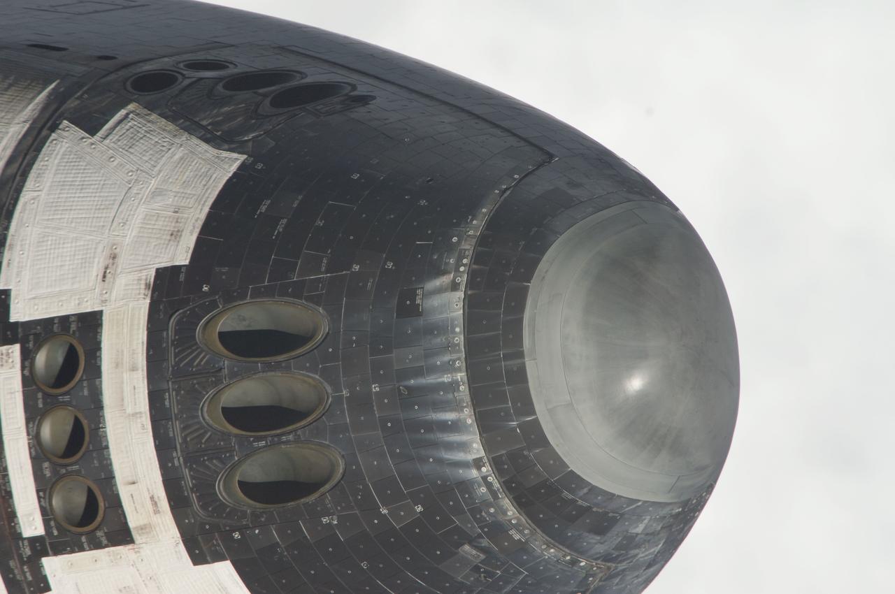 ISS028-E-015094  (10 July 2011) --- This nose view is one of a series of images showing various parts of the space shuttle Atlantis in Earth orbit as photographed by one of the six crewmembers on the International Space Station as the shuttle “posed” for photo and visual surveys and performed a back-flip for the rendezvous pitch maneuver (RPM). An 800 millimeter lens was used to capture this particular series of images.