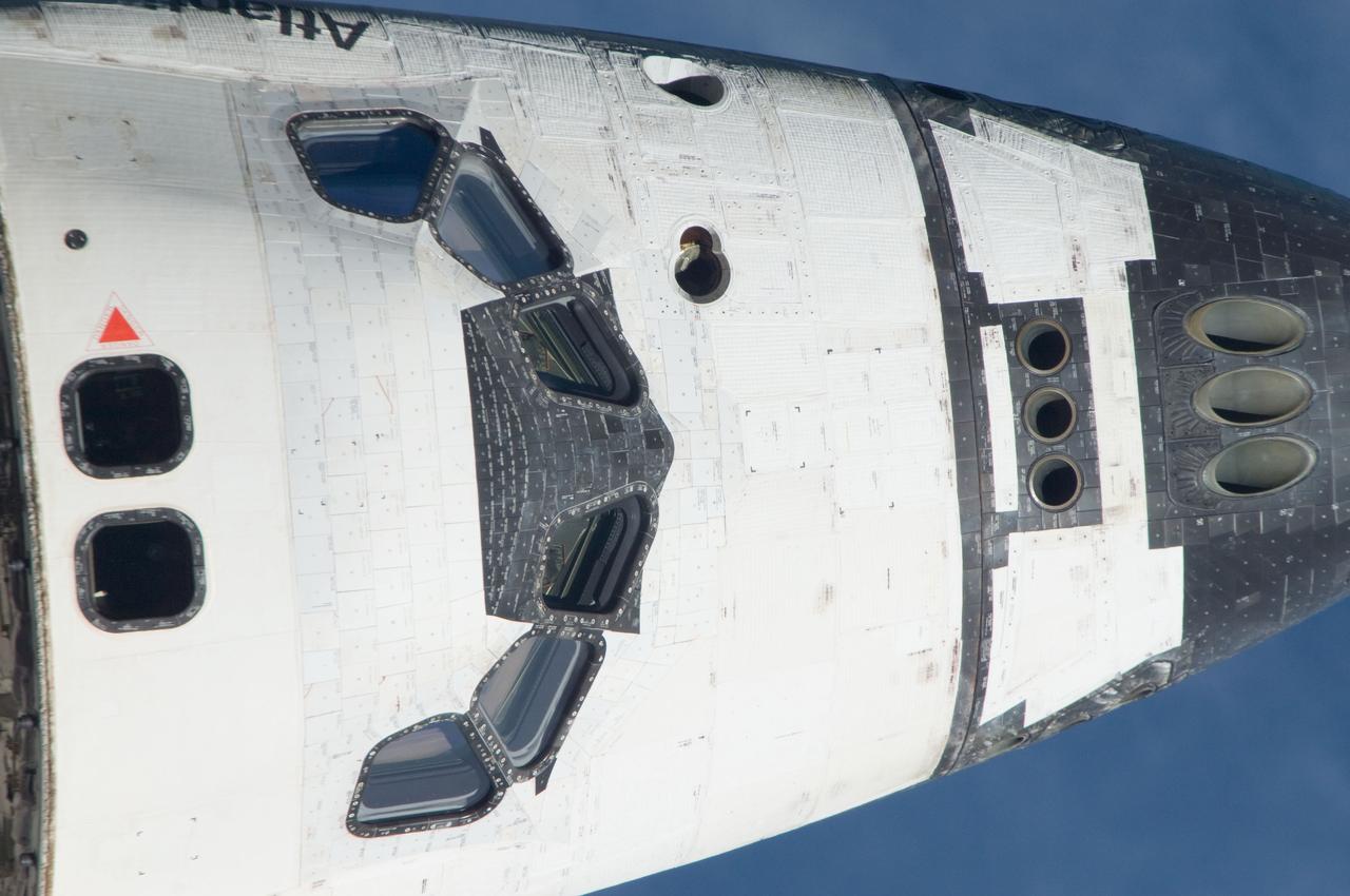 ISS028-E-015098 (10 July 2011) --- This is one of a series of images showing various parts of the space shuttle Atlantis in Earth orbit as photographed by one of the six crewmembers on the International Space Station as the shuttle “posed” for photo and visual surveys and performed a back-flip for the rendezvous pitch maneuver (RPM). An 800 millimeter lens was used to capture this particular series of images.