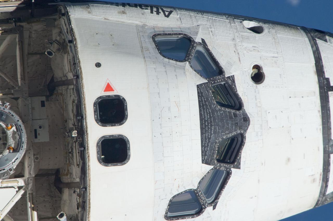ISS028-E-015099 (10 July 2011) --- This is one of a series of images showing various parts of the space shuttle Atlantis in Earth orbit as photographed by one of the six crewmembers on the International Space Station as the shuttle “posed” for photo and visual surveys and performed a back-flip for the rendezvous pitch maneuver (RPM). An 800 millimeter lens was used to capture this particular series of images.