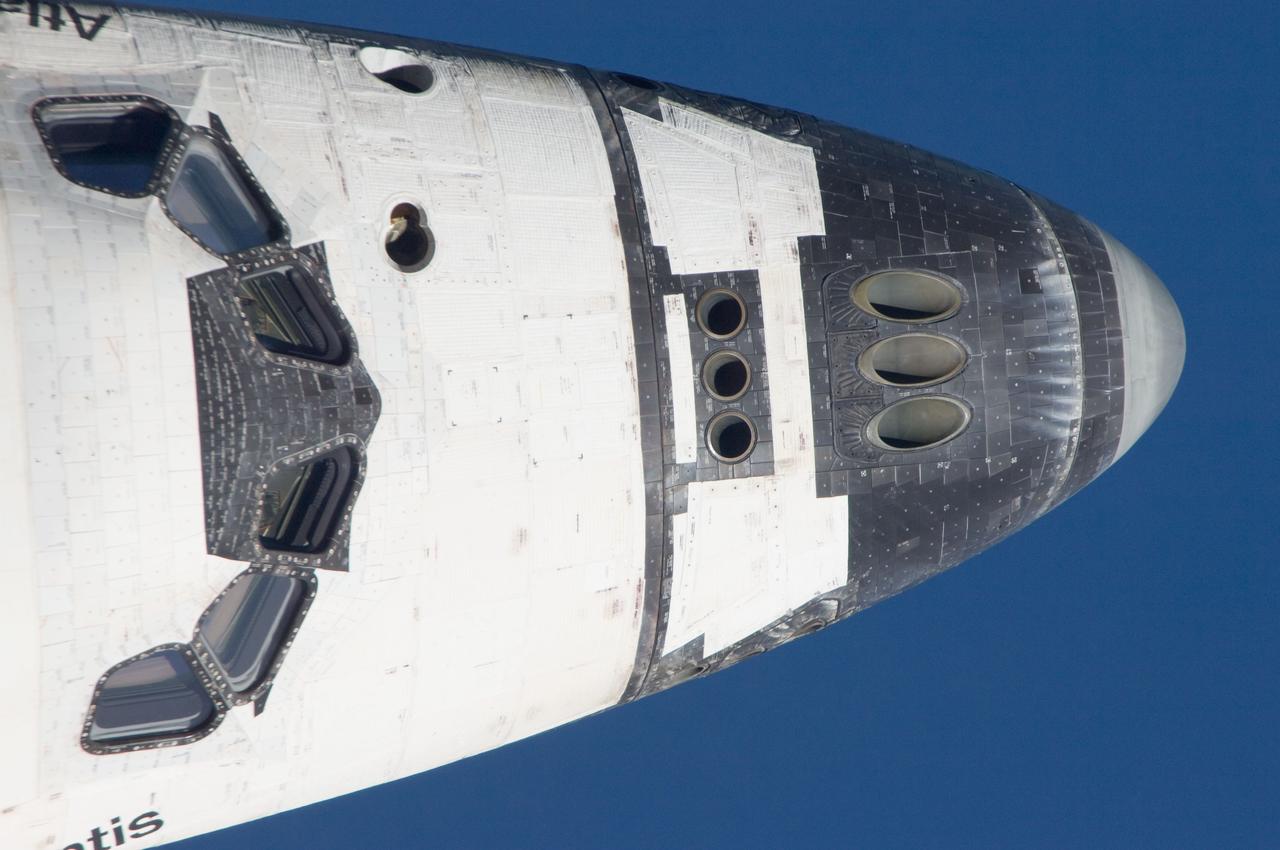ISS028-E-015147 (10 July 2011) --- This is one of a series of images showing various parts of the space shuttle Atlantis in Earth orbit as photographed by one of the six crewmembers on the International Space Station as the shuttle “posed” for photo and visual surveys and performed a back-flip for the rendezvous pitch maneuver (RPM). An 800 millimeter lens was used to capture this particular series of images.