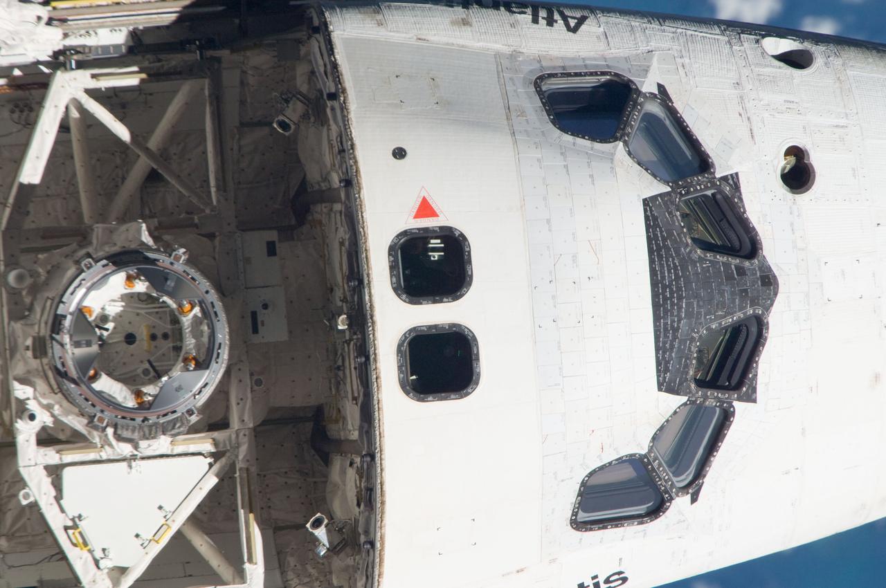 ISS028-E-015148 (10 July 2011) --- This is one of a series of images showing various parts of the space shuttle Atlantis in Earth orbit as photographed by one of the six crewmembers on the International Space Station as the shuttle “posed” for photo and visual surveys and performed a back-flip for the rendezvous pitch maneuver (RPM). An 800 millimeter lens was used to capture this particular series of images.