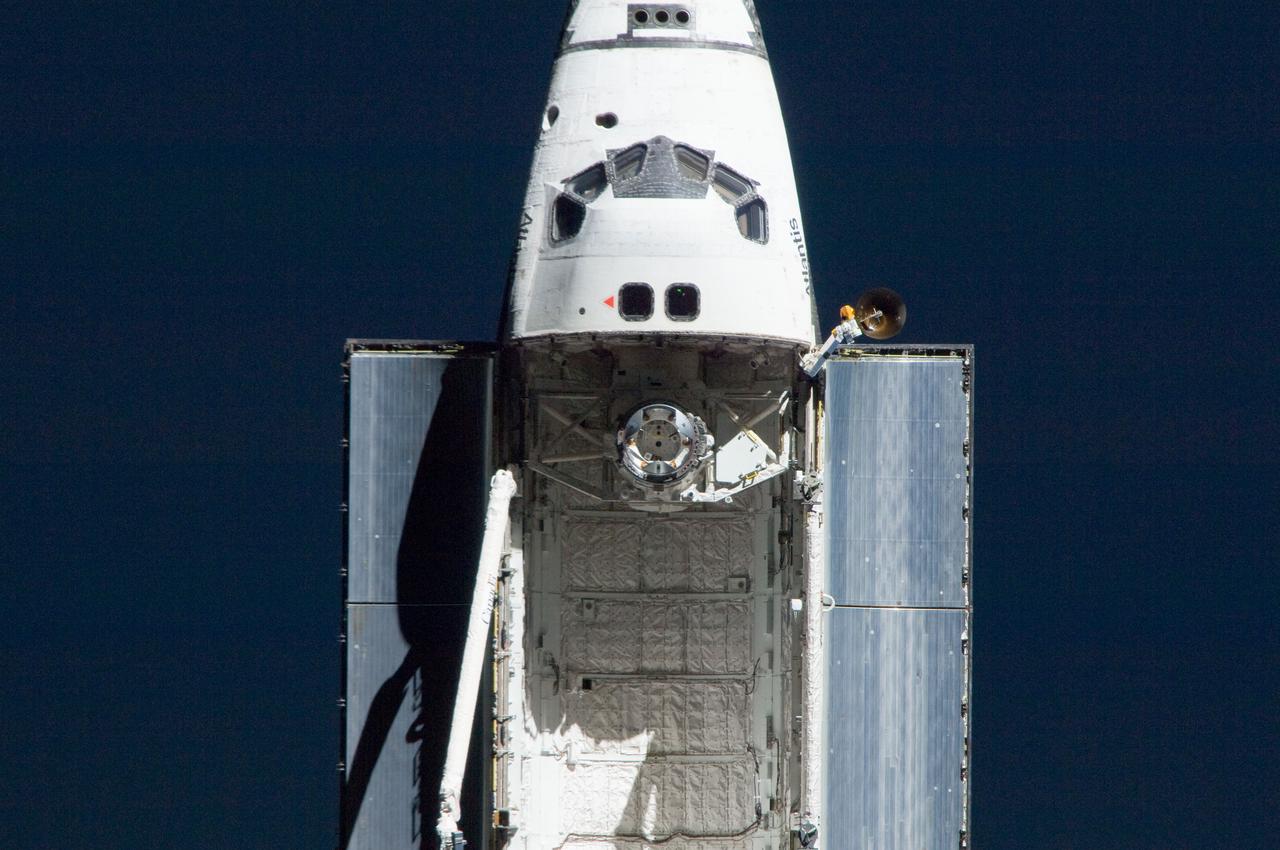 ISS028-E-015380 (10 July 2011) --- This is one of a series of images showing various parts of the space shuttle Atlantis in Earth orbit as photographed by one of the six crewmembers on the International Space Station as the shuttle “posed” for photo and visual surveys and performed a back-flip for the rendezvous pitch maneuver (RPM). An 800 millimeter lens was used to capture this particular series of images.