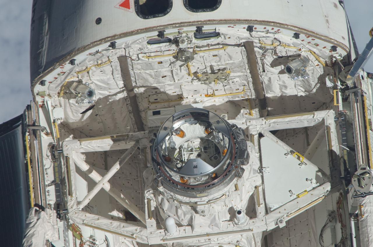 ISS028-E-015414 (10 July 2011) --- This is one of a series of images showing various parts of the space shuttle Atlantis in Earth orbit as photographed by one of the six crewmembers on the International Space Station as the shuttle “posed” for photo and visual surveys and performed a back-flip for the rendezvous pitch maneuver (RPM). An 800 millimeter lens was used to capture this particular series of images.