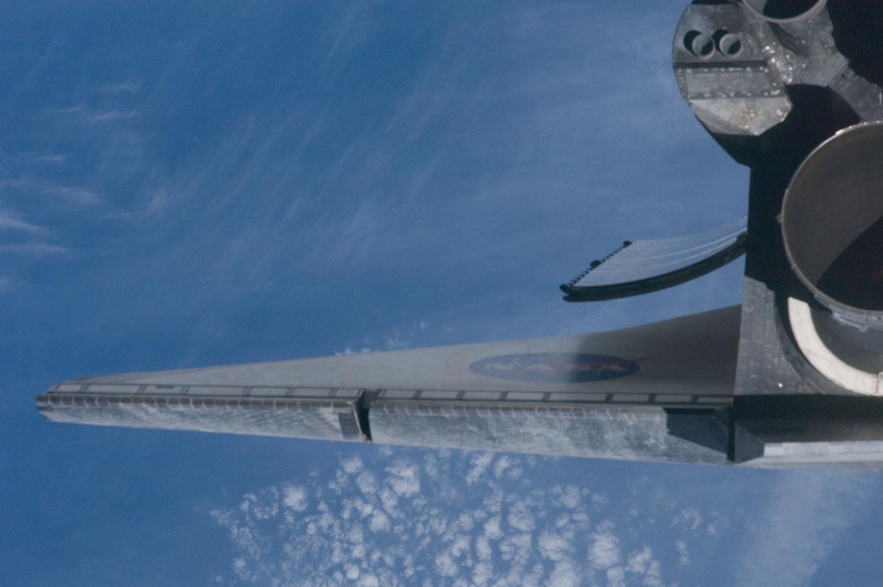 ISS028-E-015445 (10 July 2011) --- This is one of a series of images showing various parts of the space shuttle Atlantis in Earth orbit as photographed by one of three crew members -- half the station crew -- who were equipped with still cameras for this purpose on the International Space Station as the shuttle “posed” for photos and visual surveys and performed a back-flip for the rendezvous pitch maneuver (RPM). Seen at the rear of the cargo bay is the Raffaello multi-purpose logistics module, packed with supplies and spare parts for the orbiting outpost. A 400 millimeter lens was used to capture this particular series of images.