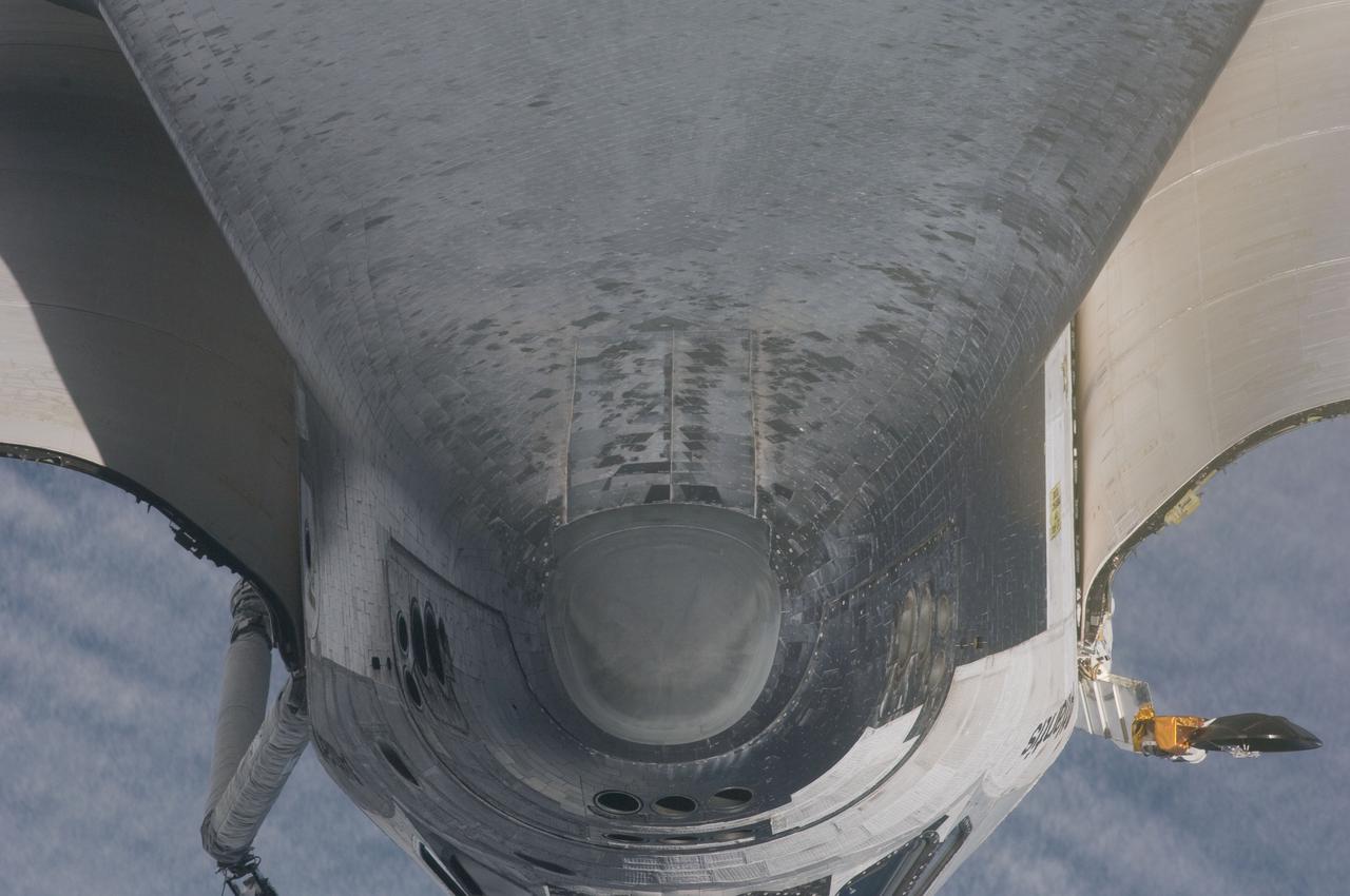 ISS028-E-015465 (10 July 2011) --- This is one of a series of images showing various parts of the space shuttle Atlantis in Earth orbit as photographed by one of three crew members -- half the station crew -- who were equipped with still cameras for this purpose on the International Space Station as the shuttle “posed” for photos and visual surveys and performed a back-flip for the rendezvous pitch maneuver (RPM). Seen at the rear of the cargo bay is the Raffaello multi-purpose logistics module, packed with supplies and spare parts for the orbiting outpost. A 400 millimeter lens was used to capture this particular series of images.