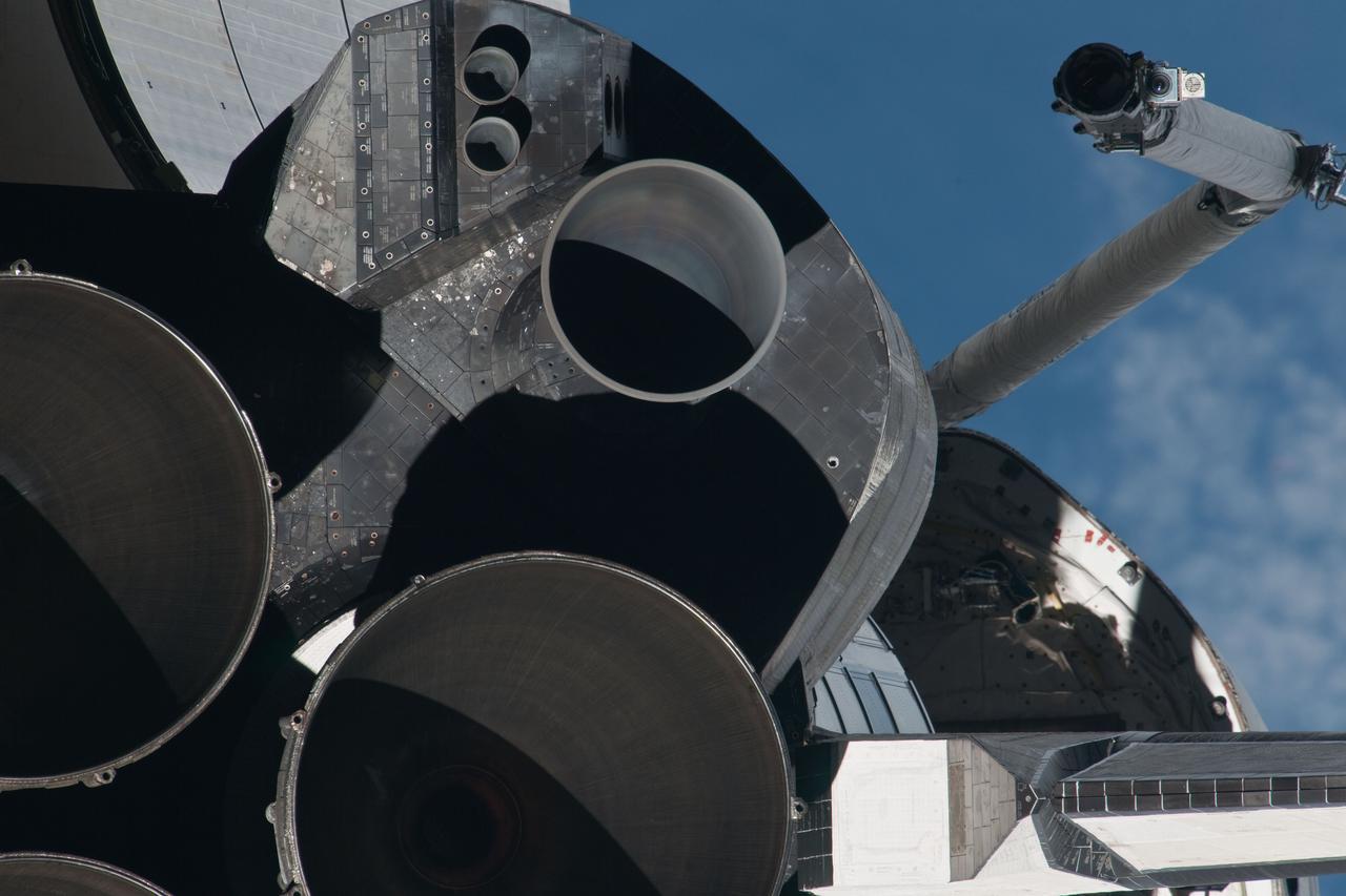 ISS028-E-015647 (10 July 2011) --- This picture of Atlantis' main and subsystem engines is one of a series of images showing various parts of the space shuttle Atlantis in Earth orbit as photographed by one of three crew members -- half the station crew -- who were equipped with still cameras for this purpose on the International Space Station as the shuttle “posed” for photos and visual surveys and performed a back-flip for the rendezvous pitch maneuver (RPM). A 1000 millimeter lens was used to capture this particular series of images.