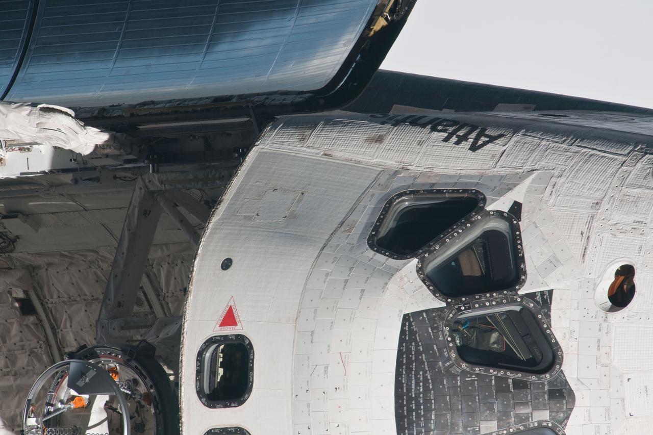 ISS028-E-015662 (10 July 2011) --- This is one of a series of images showing various parts of the space shuttle Atlantis in Earth orbit as photographed by one of three crew members -- half the station crew -- who were equipped with still cameras for this purpose on the International Space Station as the shuttle “posed” for photos and visual surveys and performed a back-flip for the rendezvous pitch maneuver (RPM). A 1000 millimeter lens was used to capture this particular series of images.