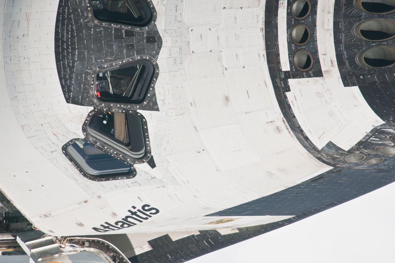 ISS028-E-015668 (10 July 2011) --- This is one of a series of images showing various parts of the space shuttle Atlantis in Earth orbit as photographed by one of three crew members -- half the station crew -- who were equipped with still cameras for this purpose on the International Space Station as the shuttle “posed” for photos and visual surveys and performed a back-flip for the rendezvous pitch maneuver (RPM). A 1000 millimeter lens was used to capture this particular series of images.