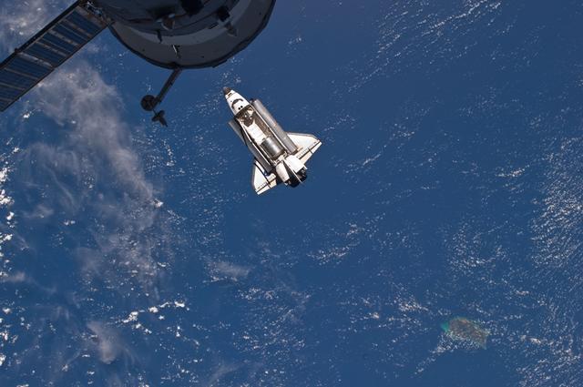 NASA image: View of the Shuttle Atlantis during approach to the ISS