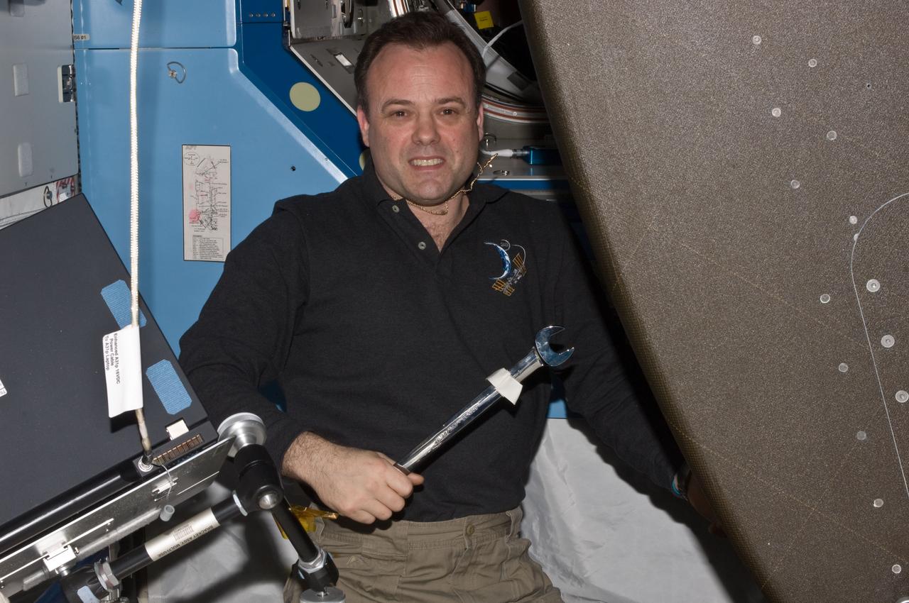 ISS028-E-017361 (17 July 2011) --- NASA astronaut Ron Garan, Expedition 28 flight engineer, works with a pulled rack in the U.S. lab or Destinty aboard the International Space Station.