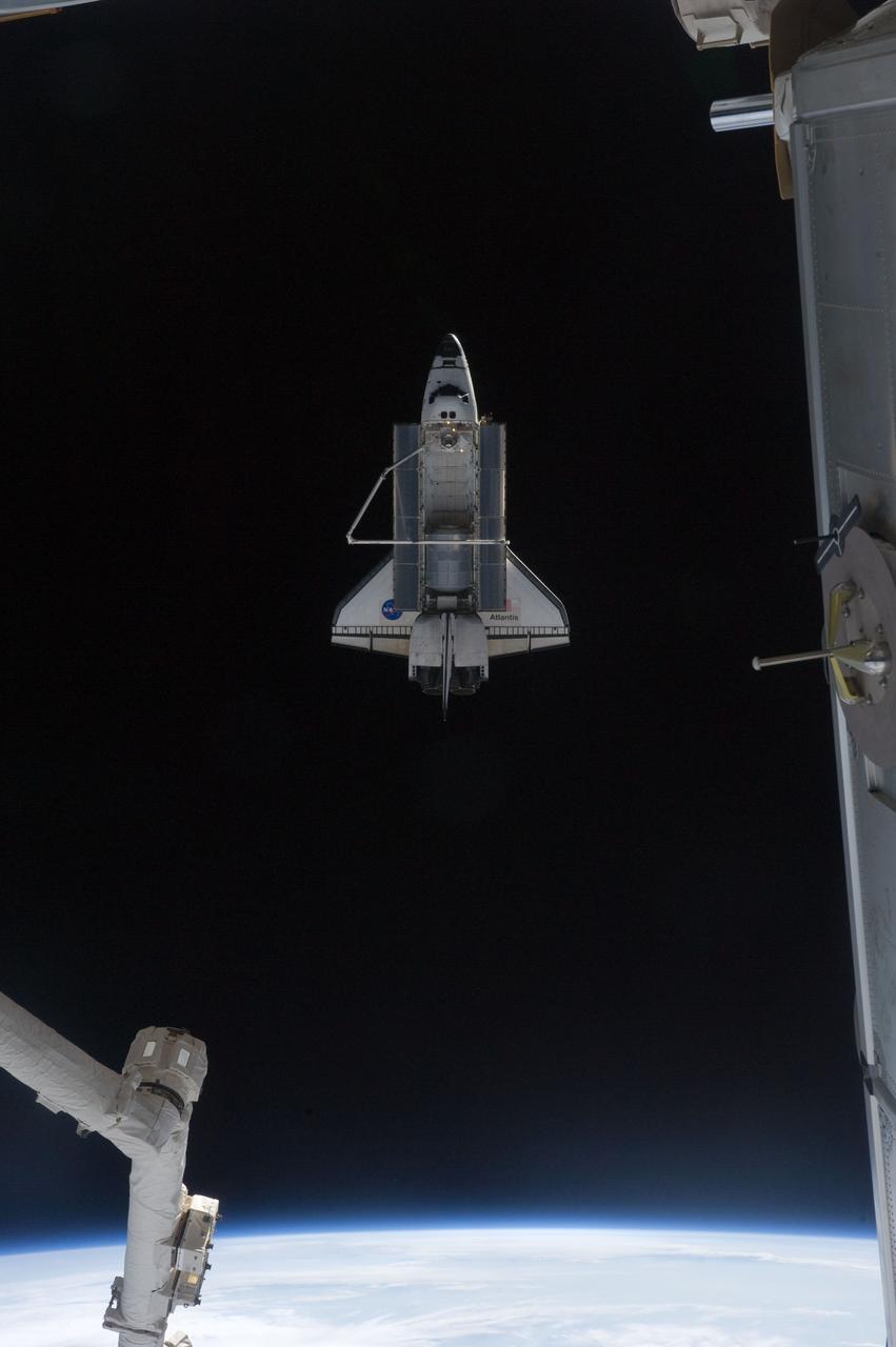 ISS028-E-018039 (19 July 2011) --- This picture of the space shuttle Atlantis was photographed from the International Space Station as the orbiting complex and the shuttle performed their relative separation in the early hours of July 19, 2011. The Raffaello multi-purpose logistics module, which transported tons of supplies to the complex, can be seen in the cargo bay. It is filled with different materials from the station for return to Earth. Onboard the station were Russian cosmonauts Andrey Borisenko, Expedition 28 commander; Sergei Volkov and Alexander Samokutyaev, both flight engineers; Japan Aerospace Exploration astronaut Satoshi Furukawa, and NASA astronauts Mike Fossum and Ron Garan, all flight engineers. Onboard the shuttle were NASA astronauts Chris Ferguson, STS-135 commander; Doug Hurley, pilot; Sandy Magnus and Rex Walheim, both mission specialists.